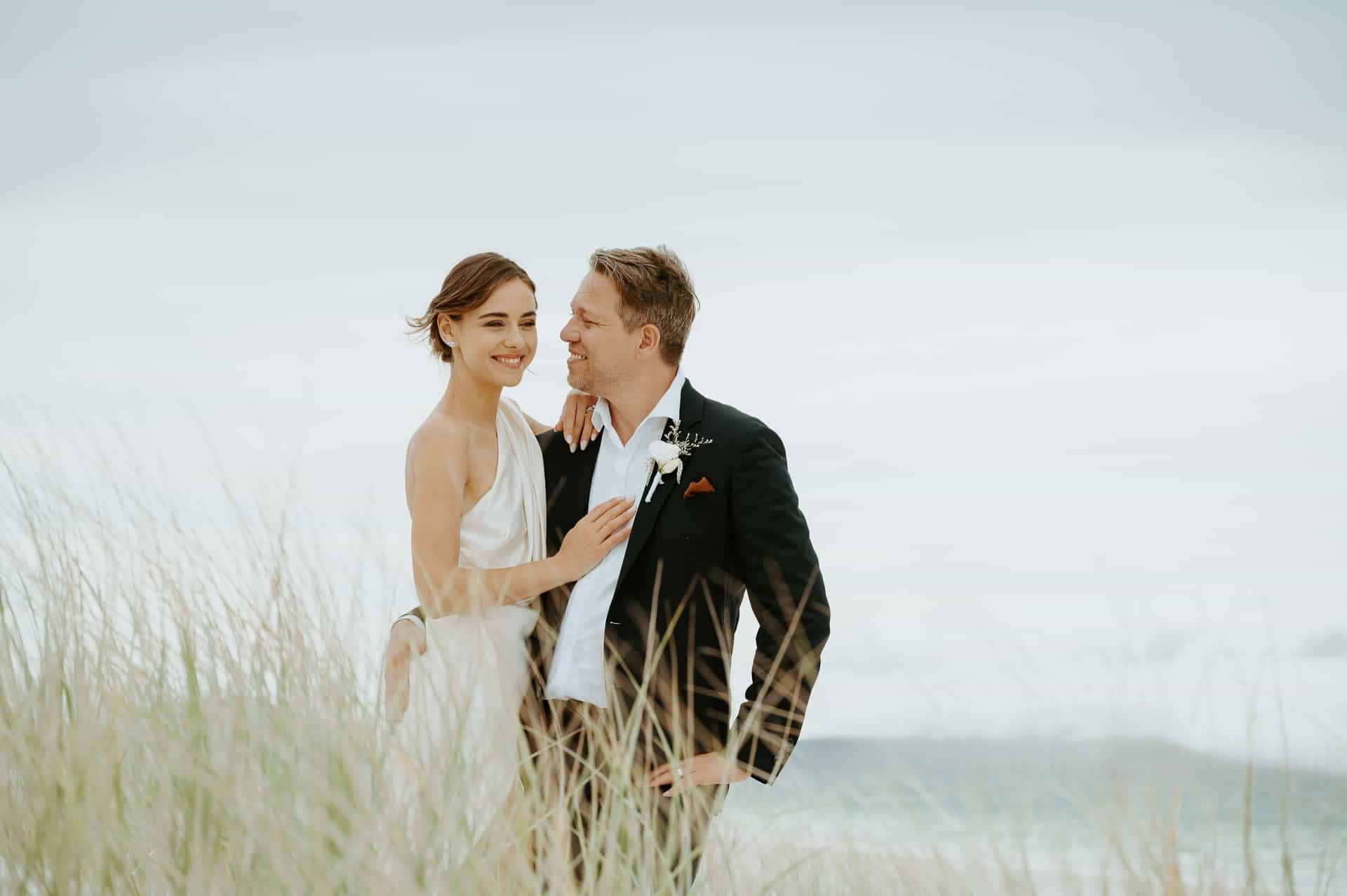 Honeymoon Island beach wedding ceremony with Gulf sunset