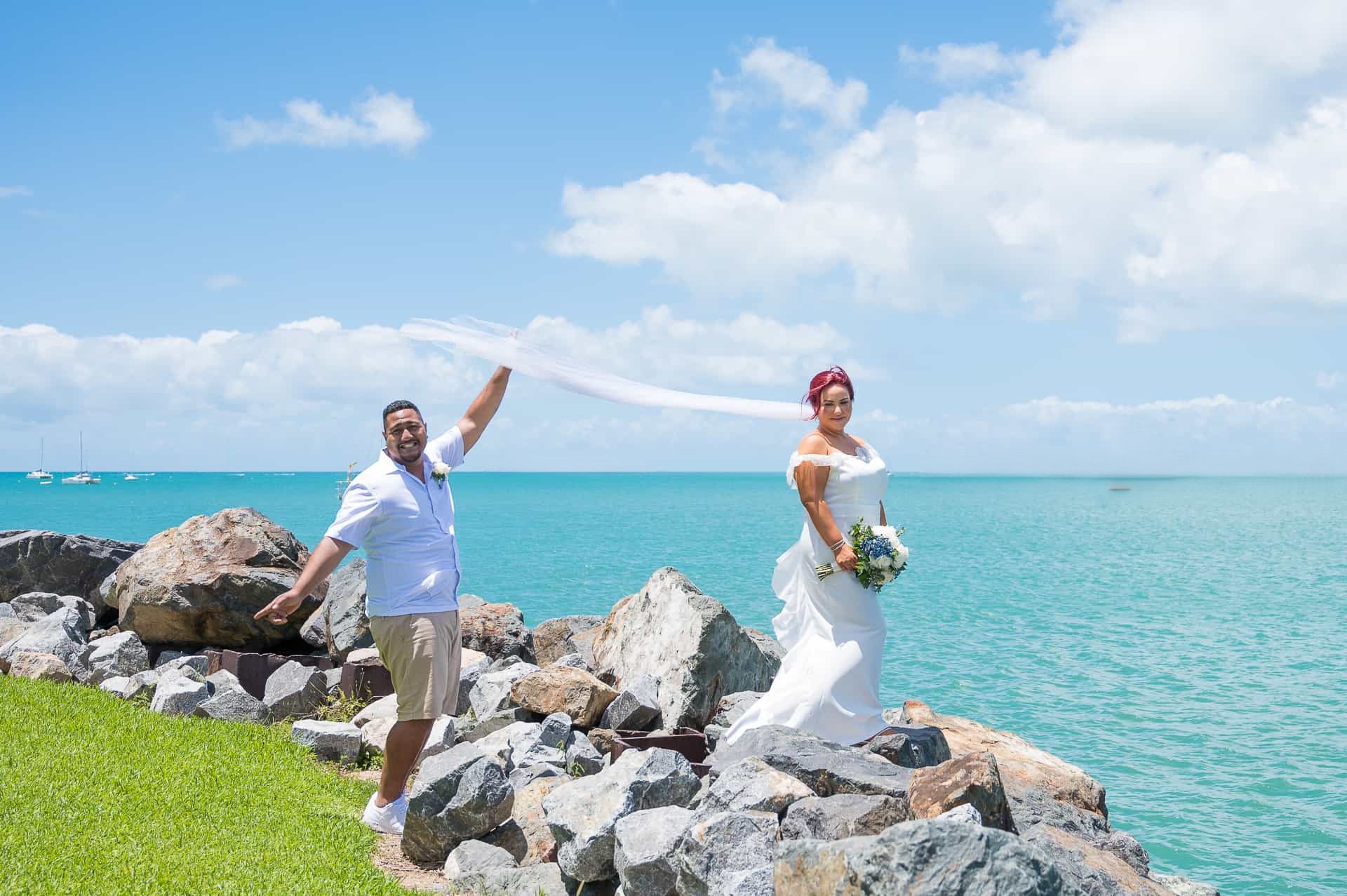 Moli and Jose exchange vows at Sand Key Beach with Gulf views