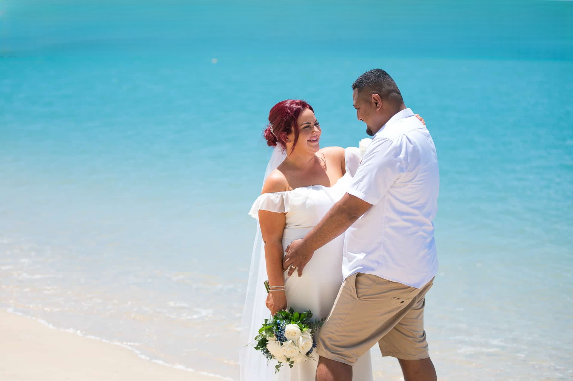 Golden-hour ceremony details at Sand Key Beach wedding