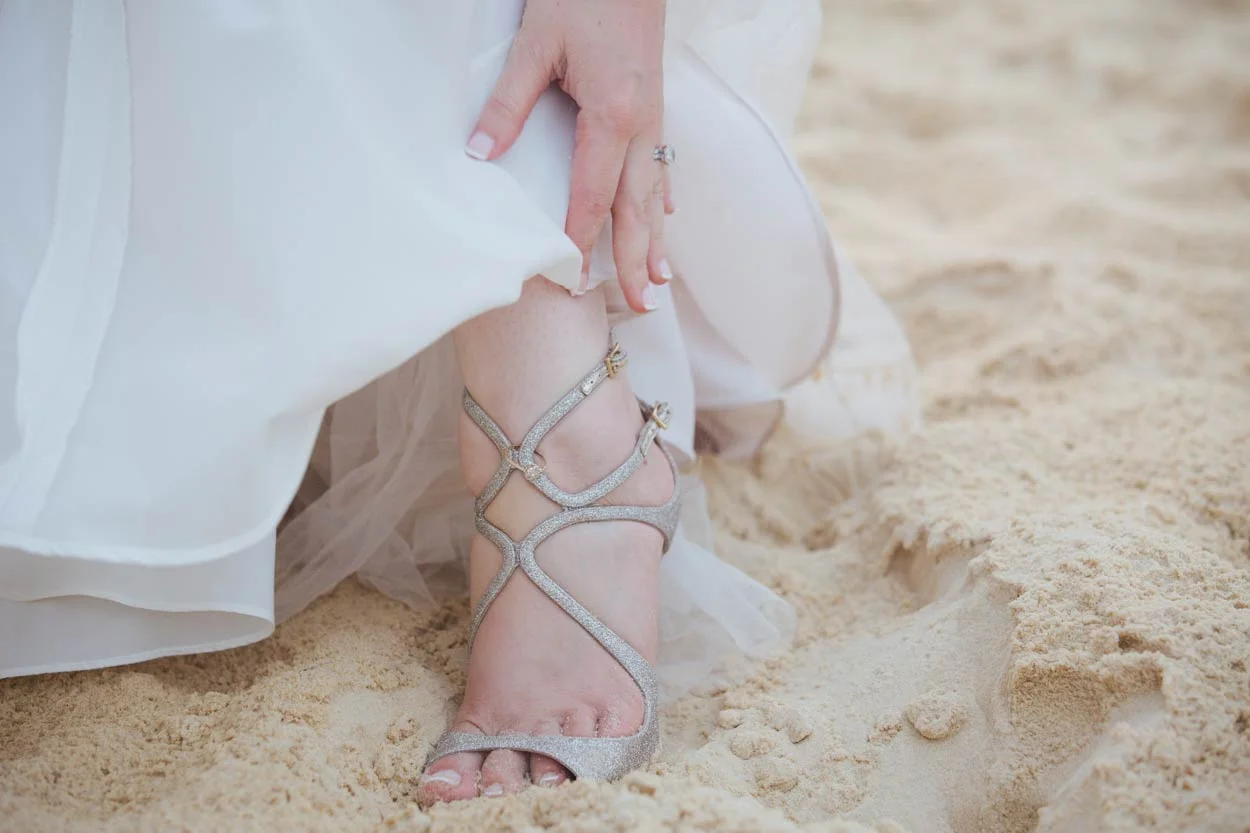 Romantic ceremony setup with a beachfront arch on Indian Rocks Beach