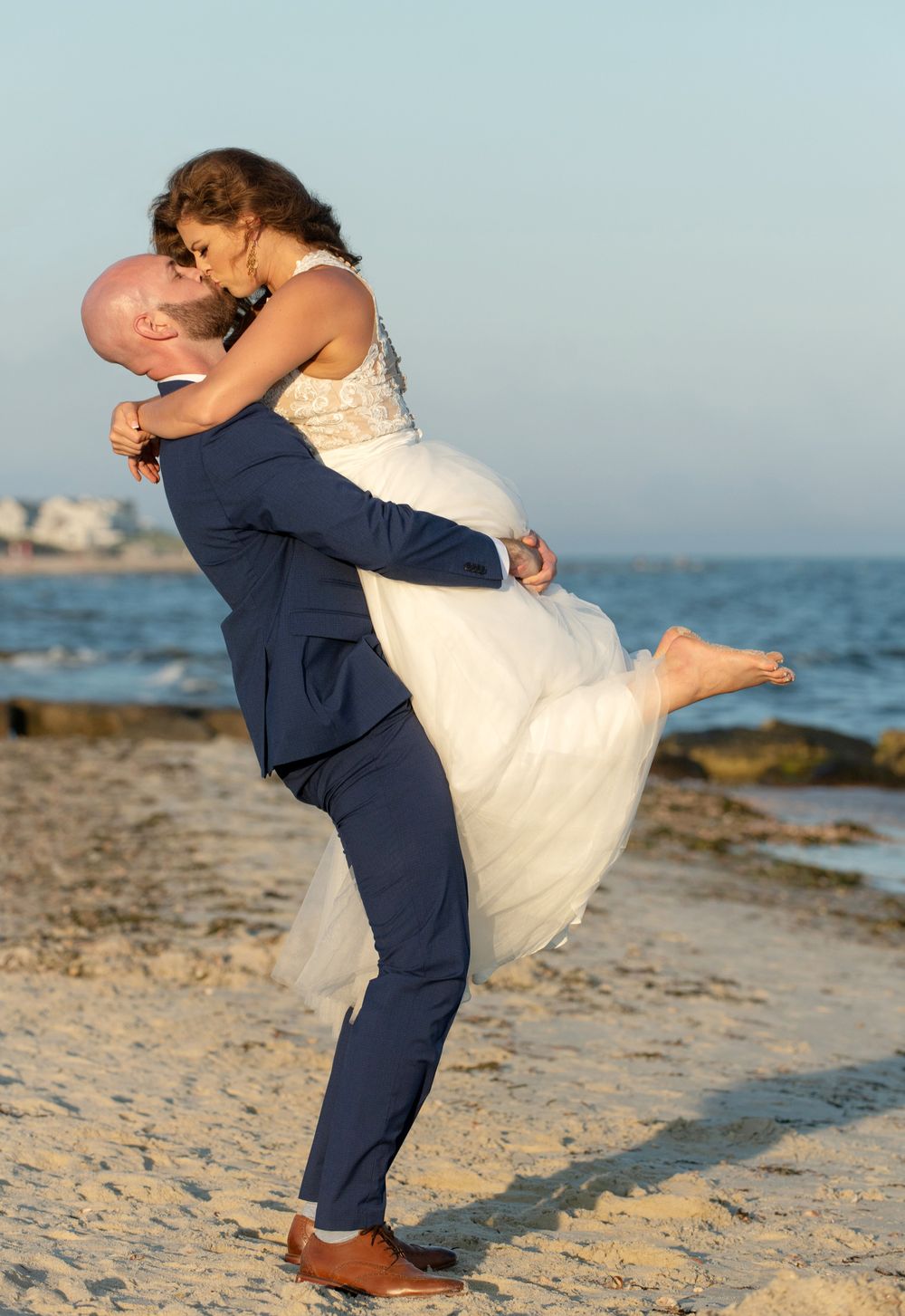 Oceanfront wedding moment at Upham Beach