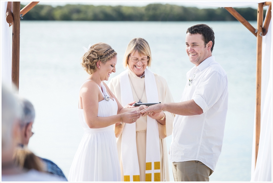 Beach wedding portraits of the couple with ocean views